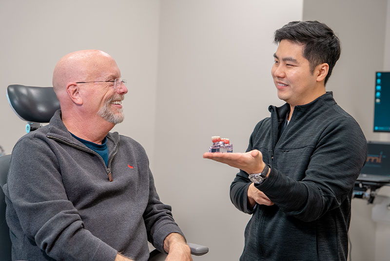 dr jung with steve showing arch